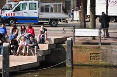 Amsterdam Homomonument with Stadsdeel Centrum vehicle in the background