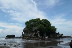 Pura Luhur Tanah Lot temple on a rock formation in Bali