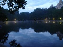 Nightfall at the lake with boats