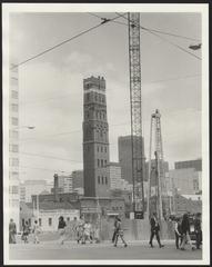 Melbourne Central Station under construction in July 1974 with Coop's Shot Tower in the background