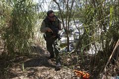 Border Patrol agent performs safe-boat landing on Rio Grande River