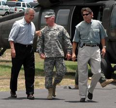 President George W. Bush greeted by Lt. Gen. H. Steven Blum and Texas Gov. Rick Perry at McAllen-Miller International Airport