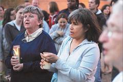 Sister Gerrie Naughton and Virginia Santana singing at an Iraq war protest in McAllen, Texas