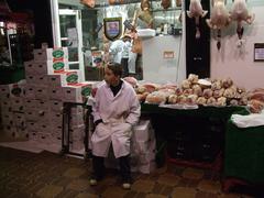 Butcher's boy in Covered Market, Oxford