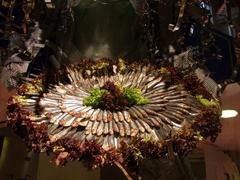 Decorative tray of sprats hanging in the Covered Market