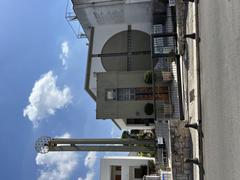 Exterior view of Alberobello's Church of Santa Maria della Madia with its distinctive trullo architecture