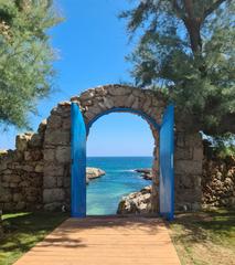 Door to the sea at Cala Diavolo, Monopoli, Puglia, Italy