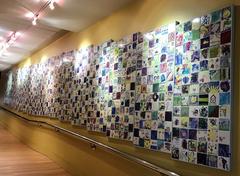 wall of tiles painted by students with disabilities during a VSA arts festival