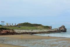 La Peñona rock formation at Salinas Beach in Asturias