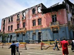 Burnt building at Plaza Dos de Mayo in Lima