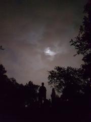 Full moon partially covered by clouds at Daman-e-Koh, Islamabad