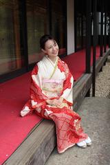 Japanese lady in Kimono sitting on Engawa