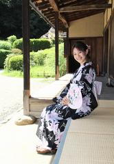 Japanese lady in Yukata sitting on Engawa