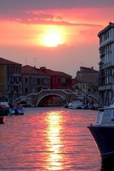 Sunset over northern canal in Venice