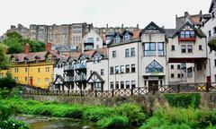 Water of Leith in Dean Village, Edinburgh with riverside path and tall buildings in the background