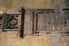 Carved plaque above a window