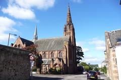 Dean Church with a stone tower and clock