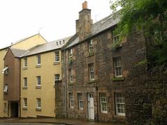 Dean Path in Dean Village descending towards Dean Bridge with a mix of old and new buildings