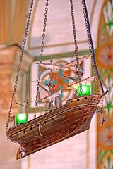 Interior of Notre-Dame-de-Bon-Secours Chapel with model ships hanging from the ceiling