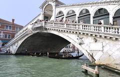 Grand Canal in Venice during the day with tourists and gondolas