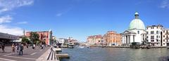 A view of the Canal Grande in Venice, Italy with boats and historic buildings lining the waterway