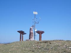 Scenic view of Monte Subasio with lush greenery and clear blue sky