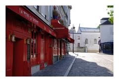 Street artist alone on the Place du Tertre in Paris