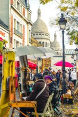 Montmartre street scene with historic buildings and cobblestone road