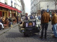 Organ grinder performing at Place du Tertre in Paris