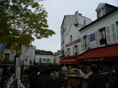 Le singe qui lit souvenirs shop at 6 Place du Tertre in Paris