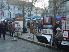 Montmartre Place du Tertre in Paris with artists and people