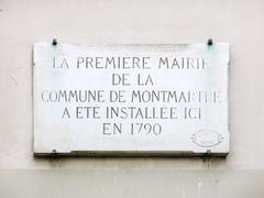 Commune de Montmartre plaque at Place du Tertre in Paris