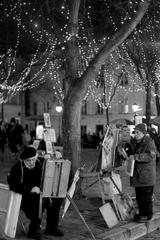 Painters at Place du Tertre packing up in Paris