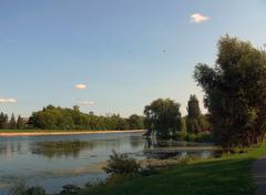 Rideau Canal in Ottawa with clear blue skies and lush green surroundings