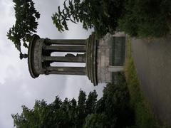 view of Calton Hill in Edinburgh showcasing historic monuments and an expansive skyline