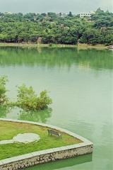 Scenic view of Durgam Cheruvu lake with surrounding cityscape