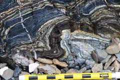 Blue folded metacherts with glaucophane-rich layers at Kayak Beach