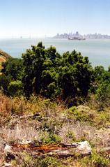 Aerial view of Angel Island State Park with San Francisco skyline in the background