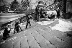 young boy in snowy Central Park, NYC