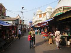 Kolkata street view with taxis and people