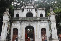 Quan Thanh Temple in Hanoi with ornate architecture and traditional Vietnamese design