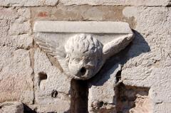 Angel sculpture on Scaligera Tower at Ponte Pietra, Verona