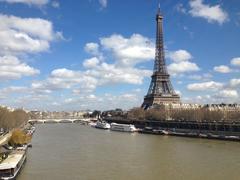 Eiffel Tower by the Seine river in Paris