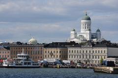 Scenic view of Helsinki's waterfront with iconic white Helsinki Cathedral in the background