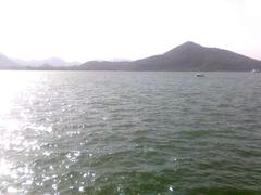 Fateh Sagar Lake with hills in the background