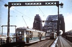 Coupled set of 'O' type trams on Harbour Bridge approach deck from Wynyard looking North