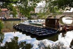 boats available for hire at a dock