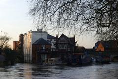 Looking Towards Folly Bridge in Oxford with buildings on a small island in the River Thames