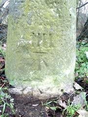 Benchmarks on the Oxford 4 milestone on south side of the A40