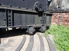 Front wheels of a 10 inch gun mount on a sunny day